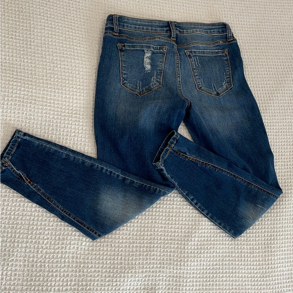 KanCan skinny ankle jeans. Distressed with split ankle detail